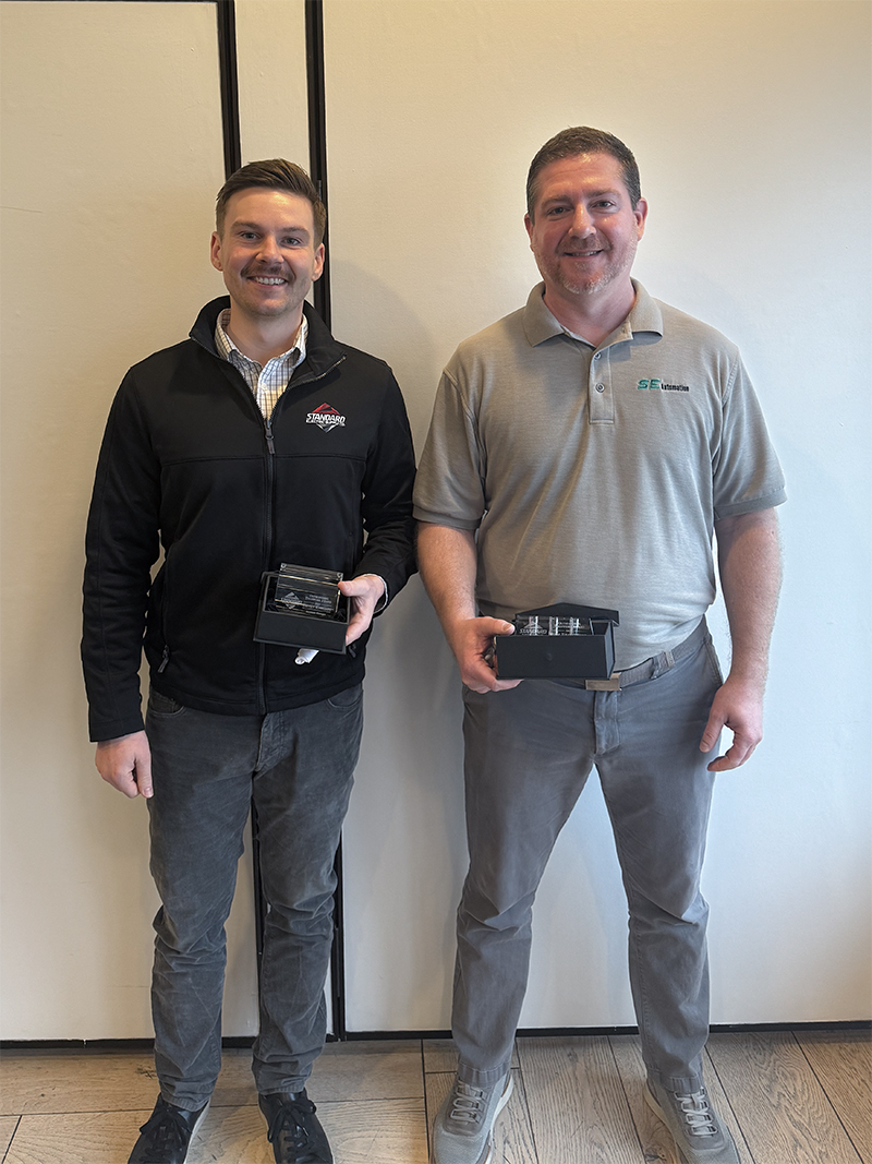 2026_Sales-Retreat_Collab-Awards_IMG_3423-4-1 Henry Karlzon (left) and Sam Brikowski (right), recipients of the 2025 SE Automation Team Collaboration Award